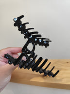Pince à cheveux noire avec fleurs – 12 cm